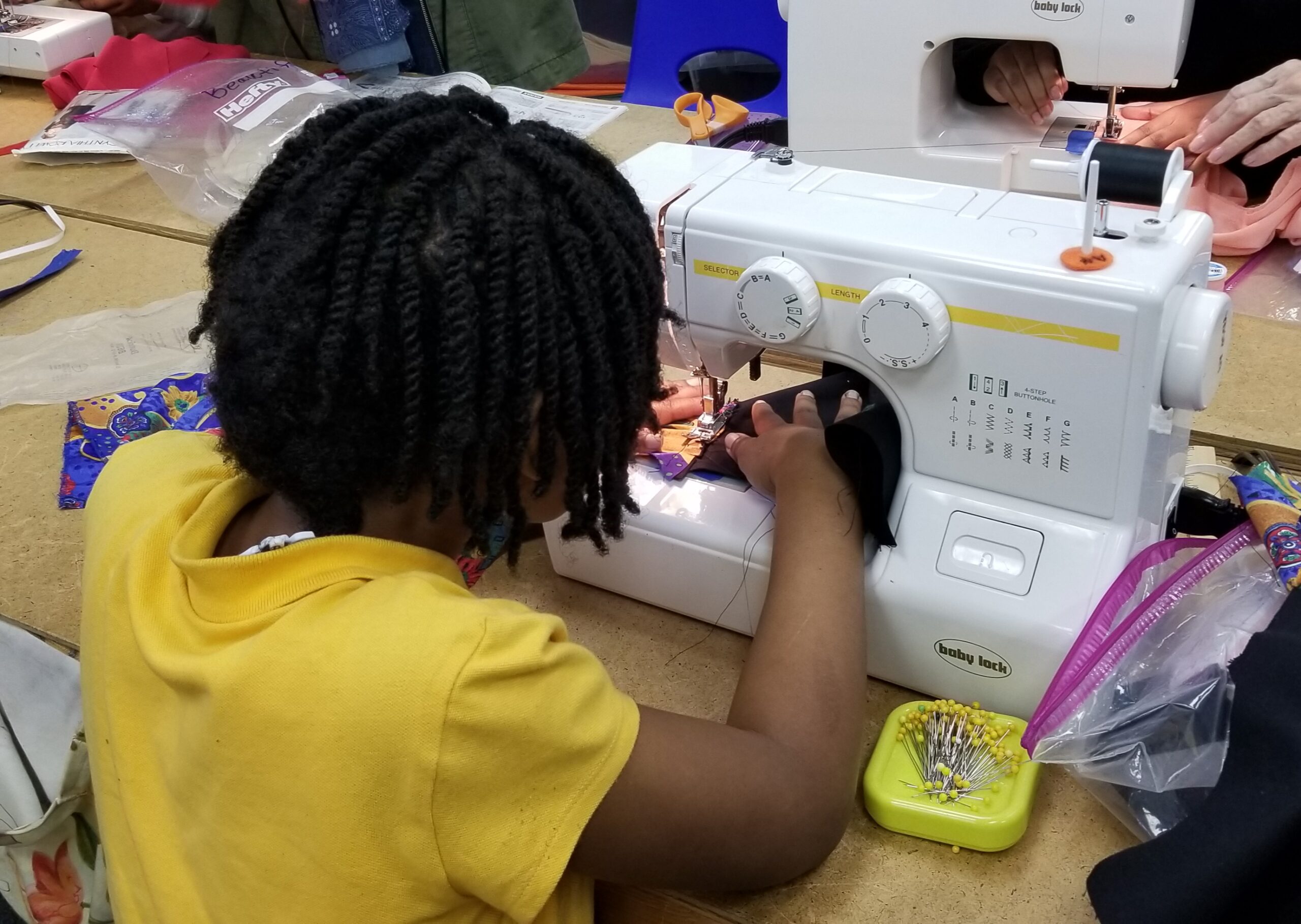 Girl sewing